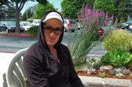 Laura wears her hoodie.