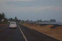 Following an old VW beetle into Kekaha