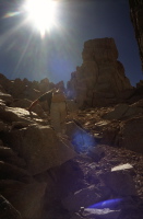 David scrambles up the chute to the Notch.
