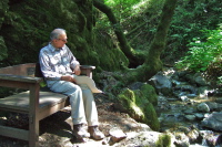 David rests at the bench by Los Trancos Creek