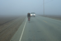 Bill Preucel leaves a healthy margin of safety at the rear of the bunch on Shore Road.