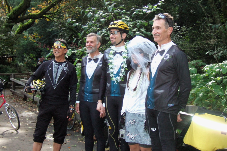 Formally-dressed party posing for photos.