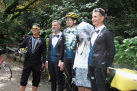 Formally-dressed party posing for photos.